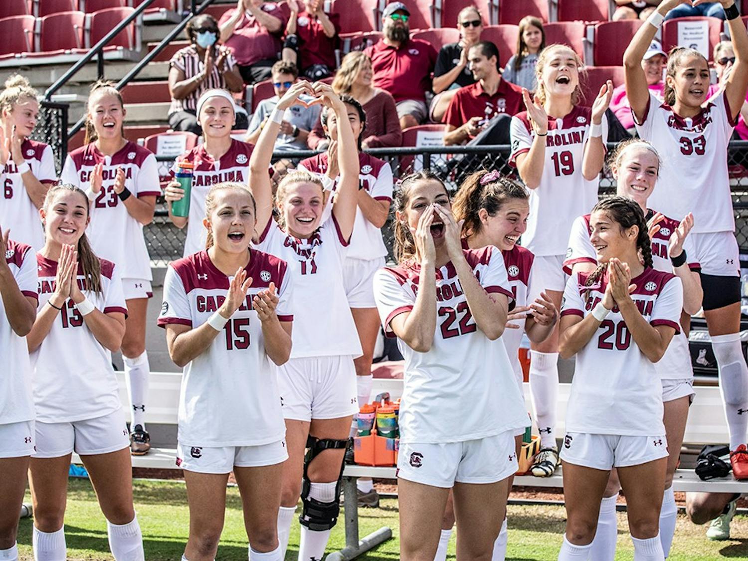 Graduate forward Ryan Gareis, and her teammates cheer at the game versus the Alabama team. The Gamecocks defeated Hofstra 3-0 on Friday, Nov. 19, which advances them to the Round of 16 of the NCAA Tournament.