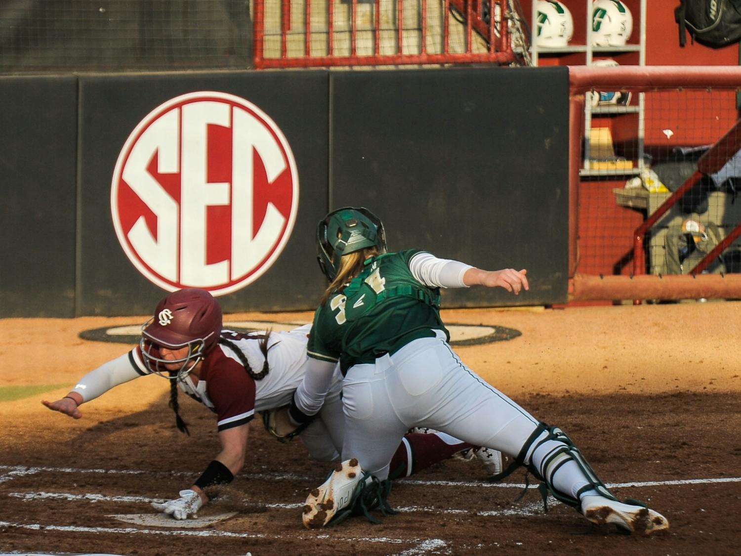 Junior catcher Jordan Fabian gets tagged on her way to the plate during the game against the Charlotte 49ers on Wednesday Feb. 16, 2022. The Carolina Gamecocks lost to the Charlotte 49ers 6 to 1.
