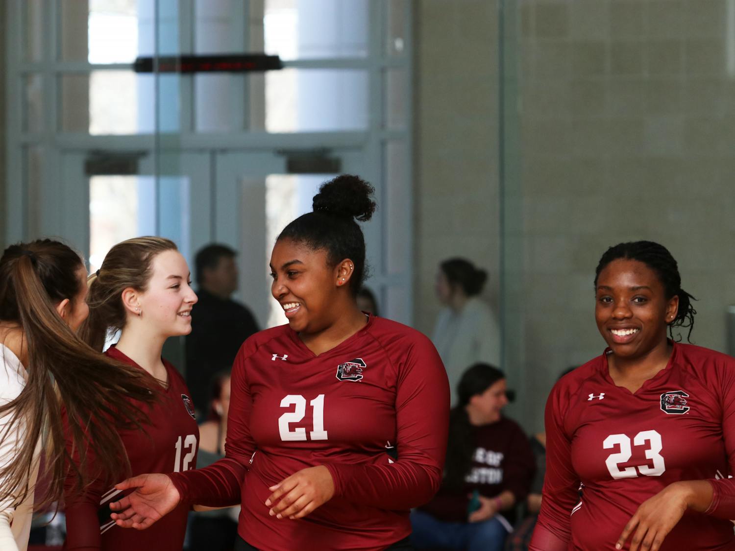 The women’s club volleyball team shares smiles after a successful rally by freshmen middle Andi Jones at its Gamecock Classic tournament on Feb. 4, 2023. The garnet team features freshman middle Andi Jones, senior setter Preya Simmons, freshman outside Jessica Layton and freshman libero/DS Gracie Kilgrore, all of who use the sports as a means to destress from school and life.