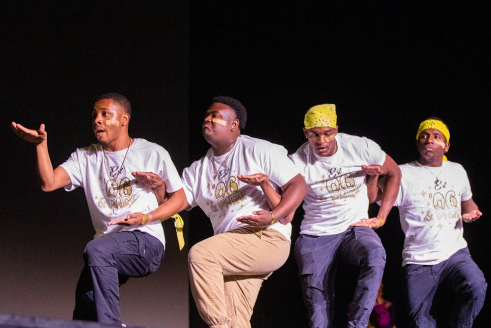 <p>The members of the Theta Nu Chapter of Alpha Phi Alpha Fraternity Inc. compete in the Stroll-Off on Oct. 27, 2022. Although it is a competition, students participating use the Stroll-Off as a chance to have fun supporting their friends.</p>