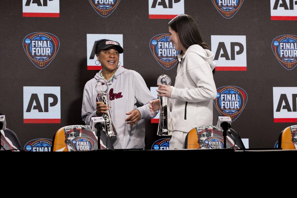 <p>ɫɫƵ women’s basketball head coach Dawn Staley (left) and Iowa senior guard Caitlin Clark (right) laugh while walking off stage after receiving their AP Coach and Player of the year awards, respectively. This is Staley's second time winning the AP Coach of the Year award. Staley also earned the Women's Basketball Coaches Association award for the third consecutive year and the fourth time in five years.</p>