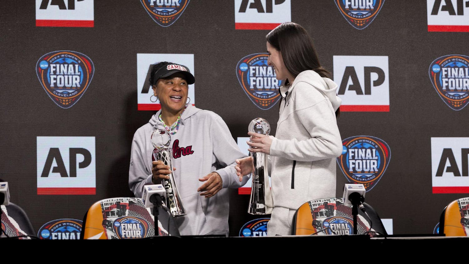ɫɫƵ women’s basketball head coach Dawn Staley (left) and Iowa senior guard Caitlin Clark (right) laugh while walking off stage after receiving their AP Coach and Player of the year awards, respectively. This is Staley's second time winning the AP Coach of the Year award. Staley also earned the Women's Basketball Coaches Association award for the third consecutive year and the fourth time in five years.