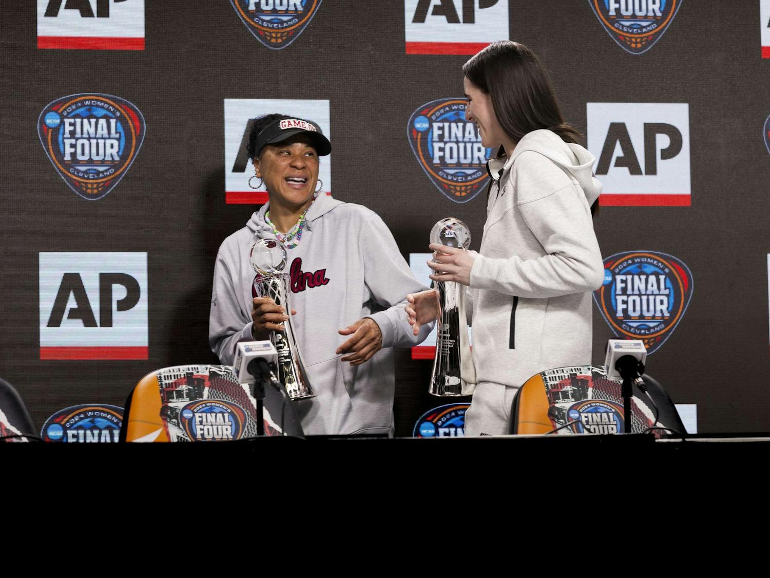 Gamecock women’s basketball head coach Dawn Staley (left) and Iowa senior guard Caitlin Clark (right) laugh while walking off stage after receiving their AP Coach and Player of the year awards, respectively. This is Staley's second time winning the AP Coach of the Year award. Staley also earned the Women's Basketball Coaches Association award for the third consecutive year and the fourth time in five years.