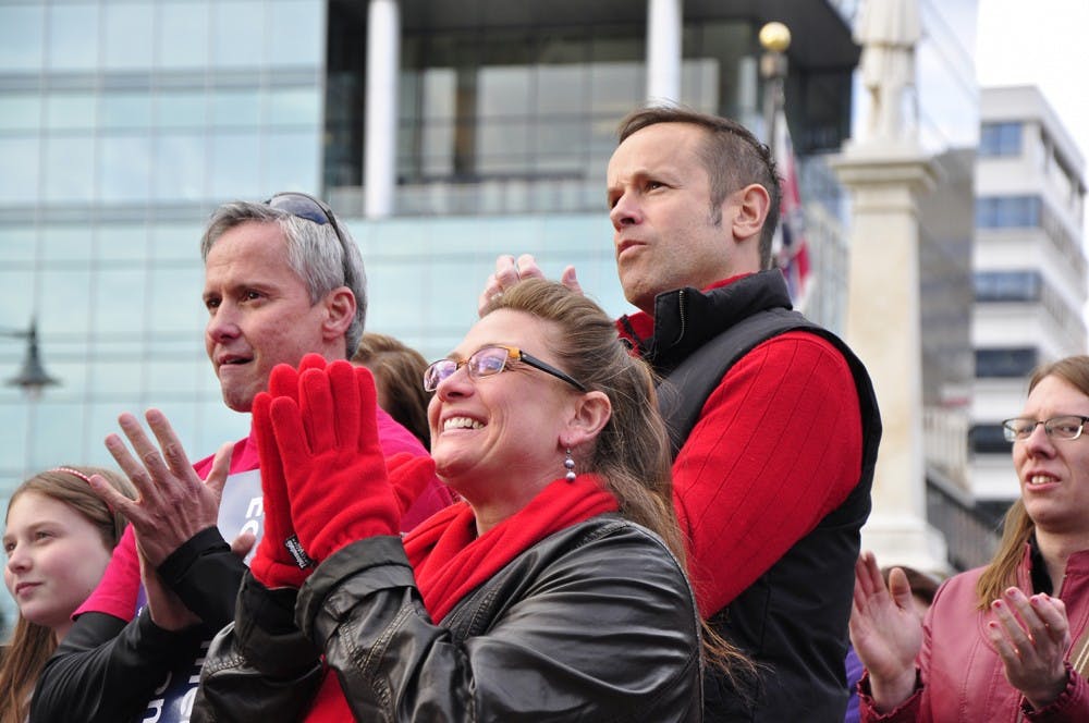 	A crowd of protesters wore red and chanted in support of same-sex marriage at the Statehouse Tuesday.
Speakers included Ryan Wilson, executive director of S.C. Equality; Carl Evans, professor emeritus of religious studies at USC and retired Methodist minister; and Zac Baker, former president of the Bisexual, Gay, Lesbian, Straight Alliance.