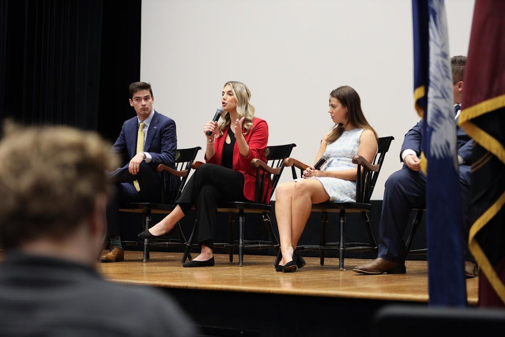 <p>FILE - Courtney Tkacs, the candidate for student body vice president, answers a question during the Student Government debate on Feb. 14, 2024. Tkacs is a second-year public health and political science student.</p>