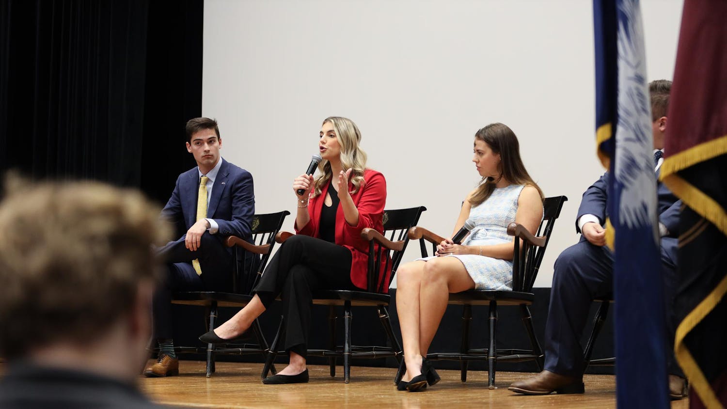 FILE - Courtney Tkacs, the candidate for student body vice president, answers a question during the Student Government debate on Feb. 14, 2024. Tkacs is a second-year public health and political science student.