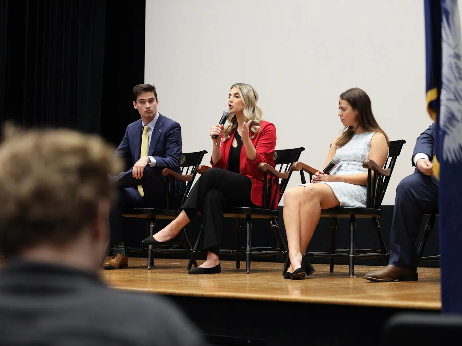 FILE - Courtney Tkacs, the candidate for student body vice president, answers a question during the Student Government debate on Feb. 14, 2024. Tkacs is a second-year public health and political science student.