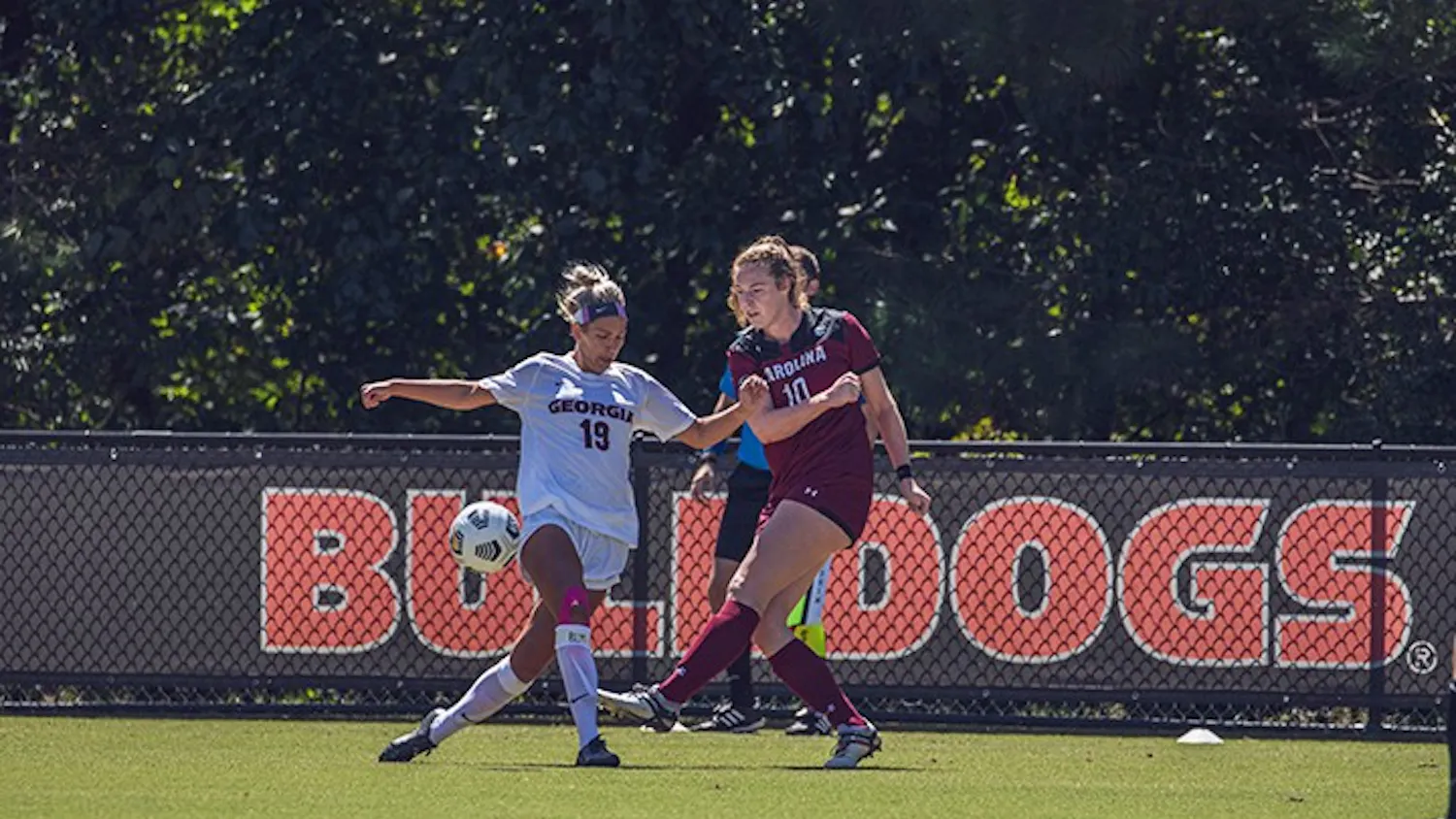 Freshman forward Catherine Barry dribbles around a defender in the 2020 season game against Georgia. Barry is one of eight freshmen on the Gamecocks' roster.