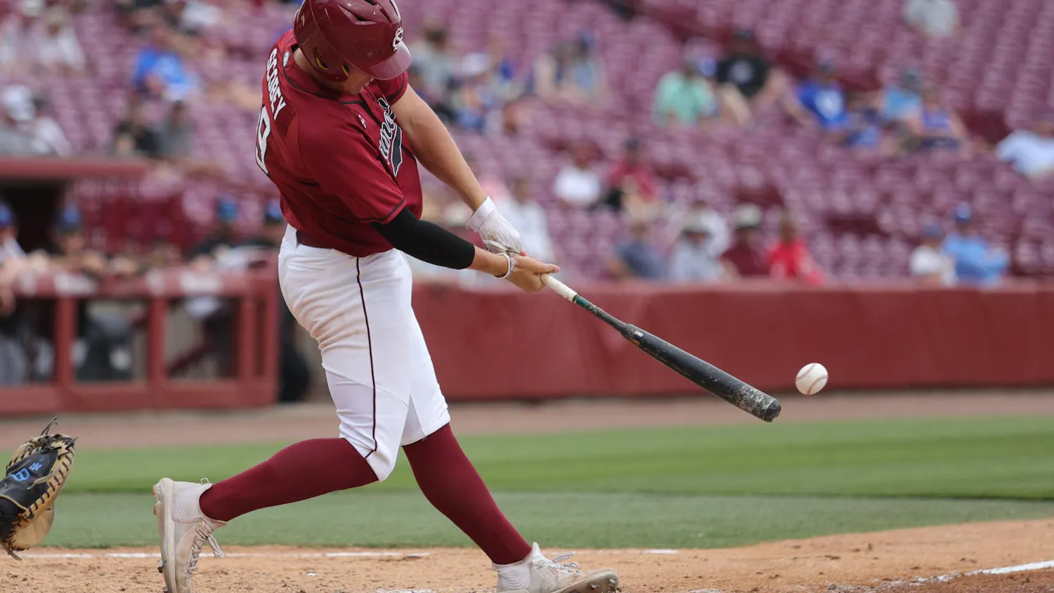 Sophomore infielder KJ Scobey hits the ball against Kentucky on April 25, 2026, at Founders Park in Columbia, South Carolina. The ball moves into the infield on the play.