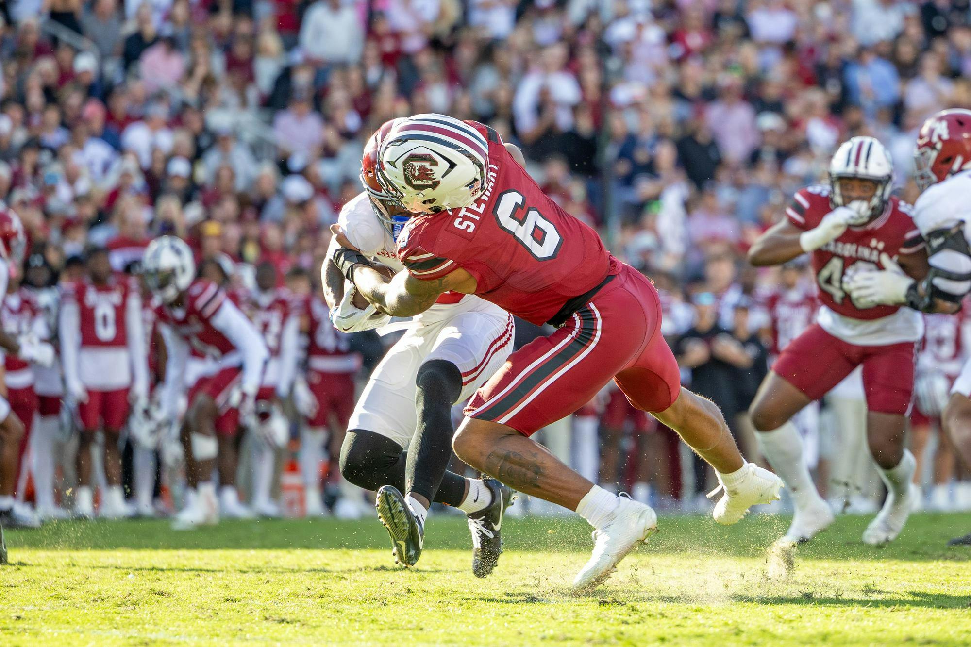 Sophomore edge Dylan Stewart tackles an Alabama player during a game on Oct. 25, 2025, at Williams-Brice Stadium. Stewart had one solo tackle against the Crimson Tide.