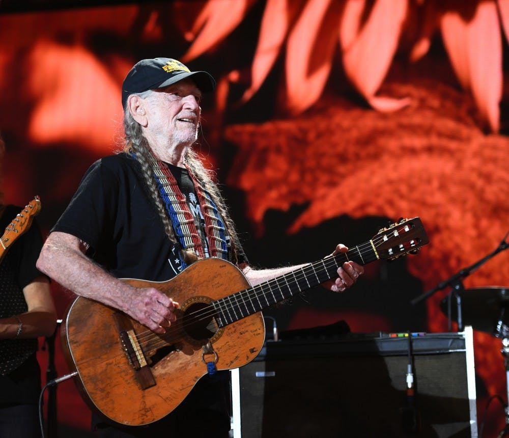 Willie Nelson entertains the crowd at Farm Aid 2017 In Burgettstoen, Pa., on Sept. 16, 2017. Nelson will play at a rally for Beto O'Rourke on Sept. 29. (Jeff Moore/Zuma Press/TNS) 