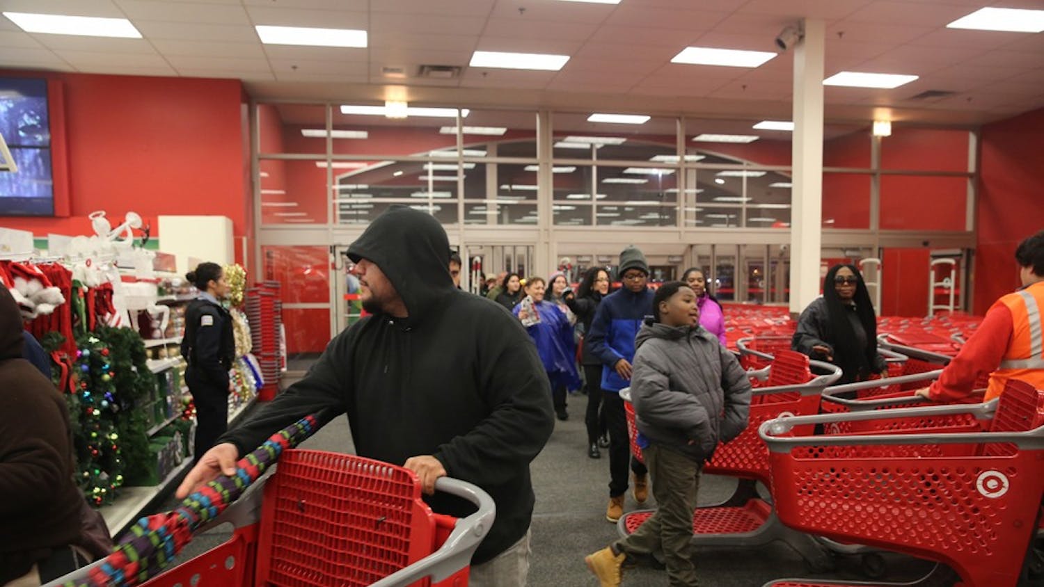 Shoppers enter to shop Black Friday sales at a Target store in Chicago on Thursday, Nov. 26, 2015. (Brian Nguyen/Chicago Tribune/TNS)