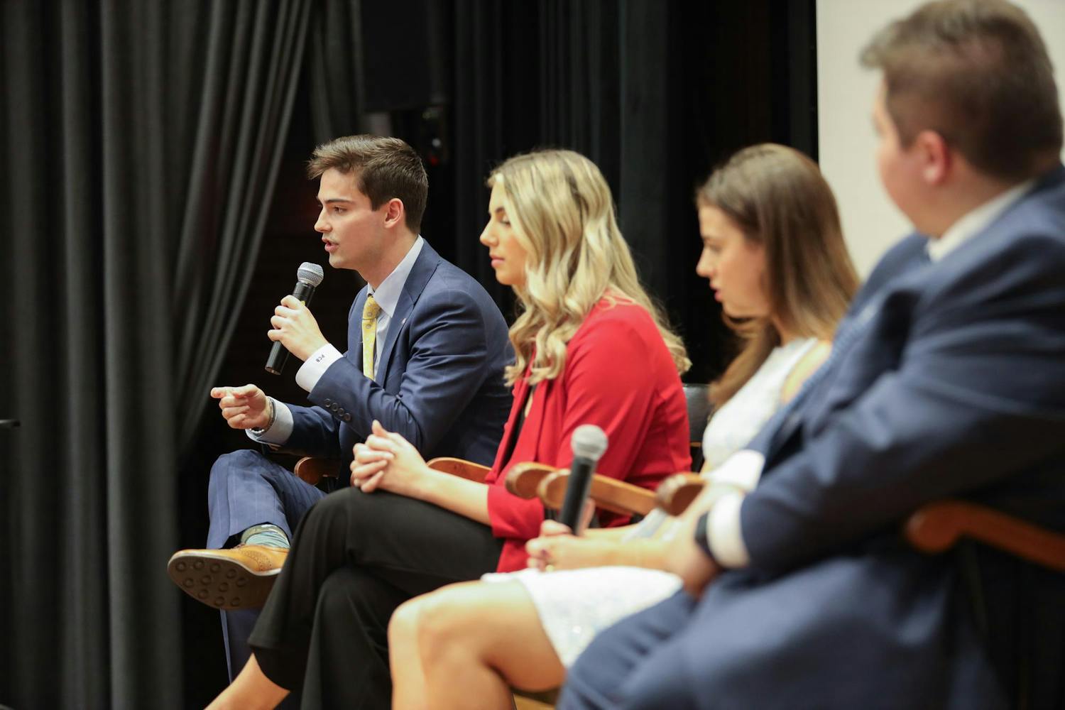 The Student Government executive candidates for ɫɫƵ body president, vice president, speaker of the senate and treasuer answer questions during the Student Government debate on Feb. 14, 2024. From left to right sits Patton Byars, Courtney Tkacs, Maura Hamilton and Jacob Vaught, all of whom run uncontested.