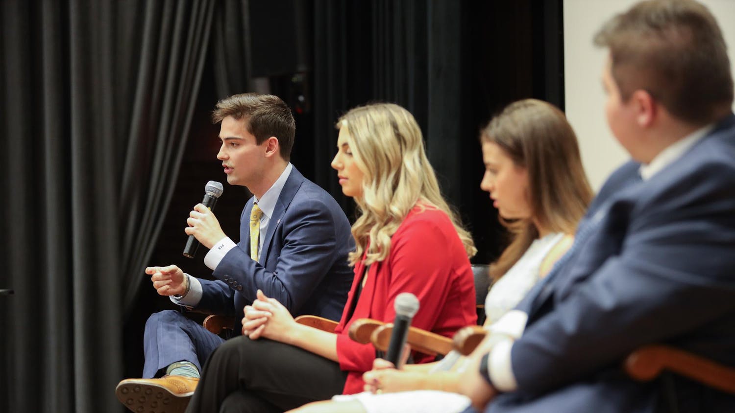 The Student Government executive candidates for student body president, vice president, speaker of the senate and treasuer answer questions during the Student Government debate on Feb. 14, 2024. From left to right sits Patton Byars, Courtney Tkacs, Maura Hamilton and Jacob Vaught, all of whom run uncontested.
