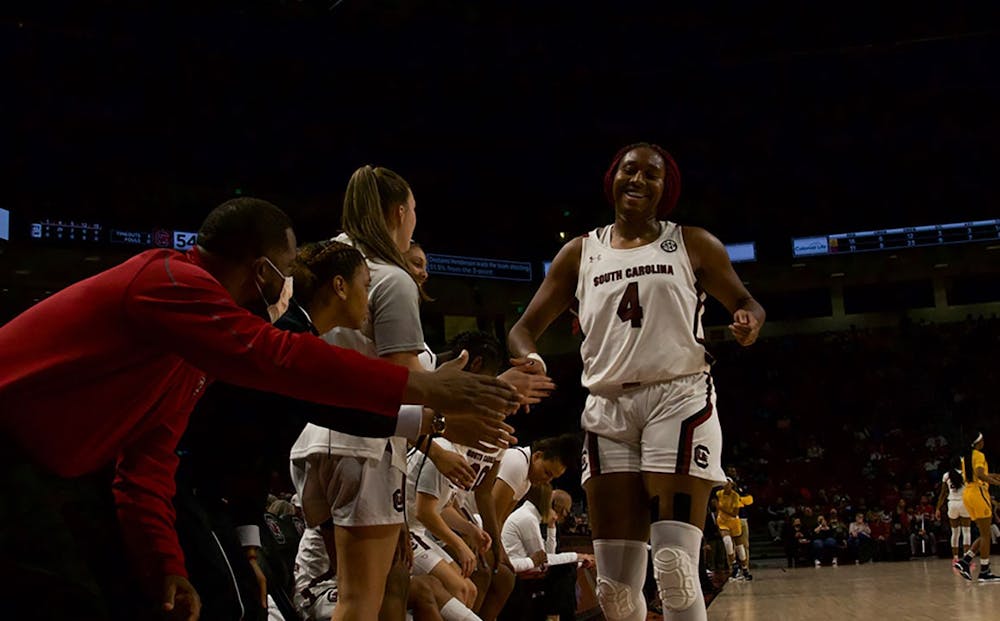 <p>Junior forward Aliyah Boston's teammates congratulate her after making a layup in the game against North Carolina A&amp;T. The Gamecocks earned 79 points against the Aggies in Monday night's matchup&nbsp;in Columbia.&nbsp;</p>