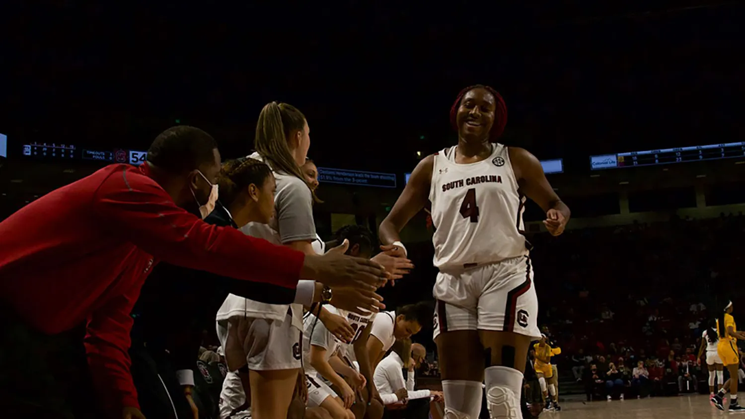 Junior forward Aliyah Boston's teammates congratulate her after making a layup in the game against North Carolina A&T. The Gamecocks earned 79 points against the Aggies in Monday night's matchup in Columbia. 