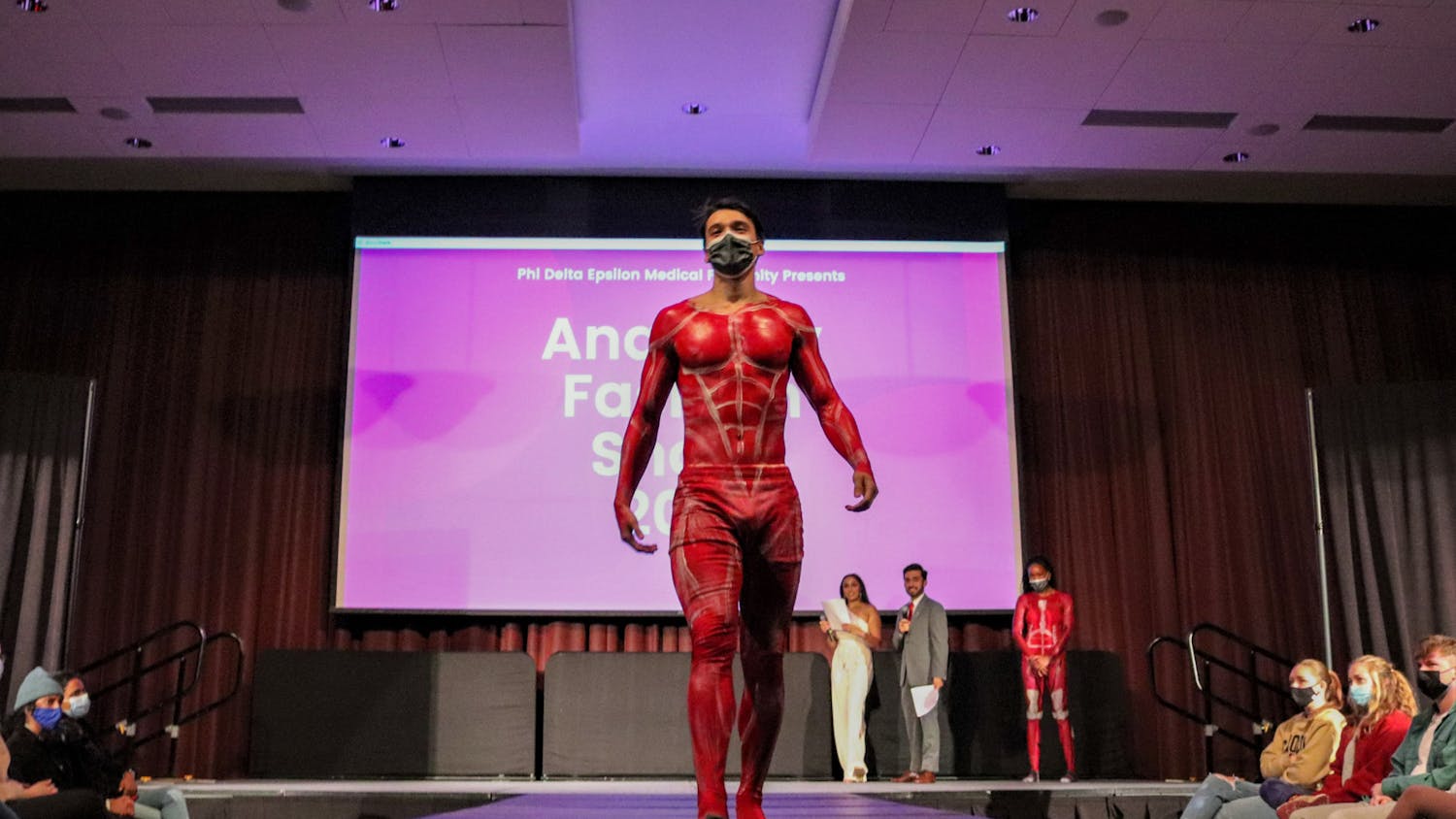 FILE— A model, painted with the muscular system walks the runway at the Phi Delta Epsilon's annual Anatomy Fashion Show on Nov. 9, 2021. This annual event combines medical education with art to fundraise for the Children's Miracle Network.&nbsp;