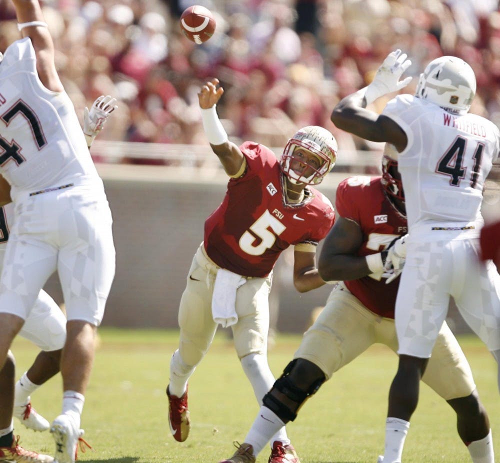 Florida State quarterback Jameis Winston throws against the Maryland defense at Doak Campbell Stadium in Talahasses, Florida, Saturday, October 5, 2013. FSU defeated Maryland, 63-0. (Stephen M. Dowell/Orlando Sentinel/MCT)