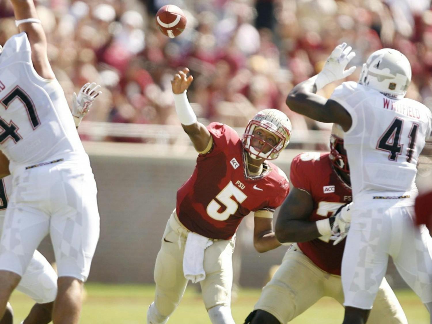 Florida State quarterback Jameis Winston throws against the Maryland defense at Doak Campbell Stadium in Talahasses, Florida, Saturday, October 5, 2013. FSU defeated Maryland, 63-0. (Stephen M. Dowell/Orlando Sentinel/MCT)