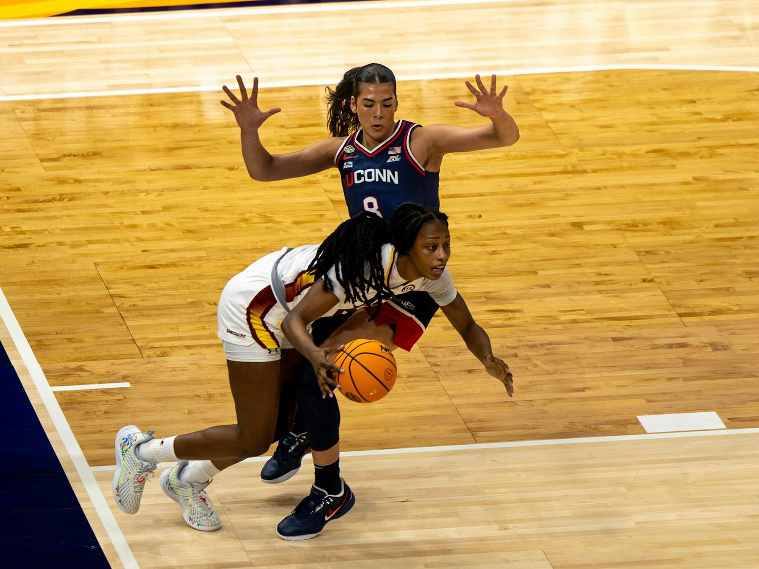 Freshman forward Joyce Edwards dribbles the ball around a UConn defender during the National Championship game on April 6, 2025 at Amalie Arena. Edwards scored 10 points and got five rebounds against the Huskies.
