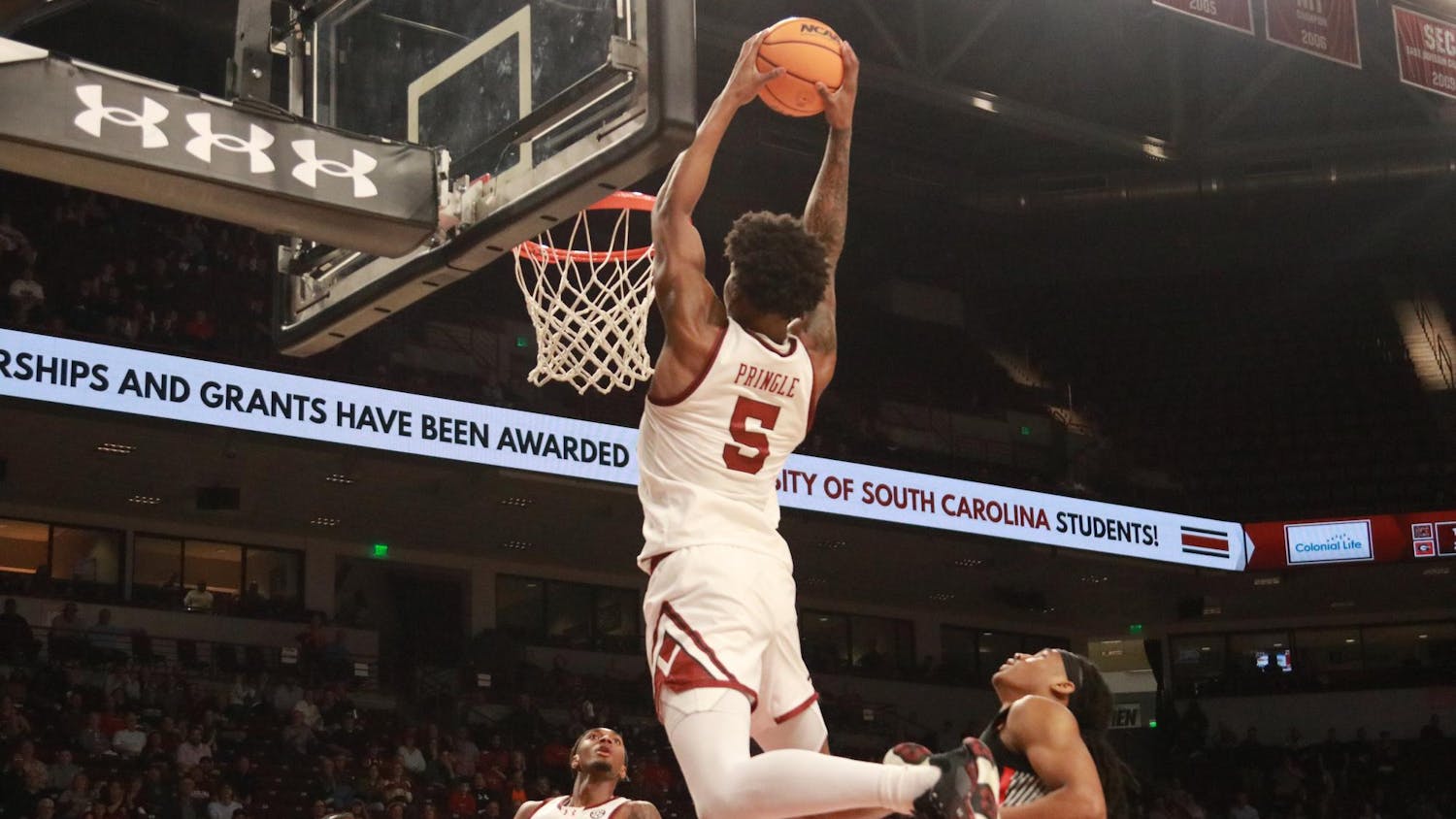Graduate forward Nick Pringle catches an alley-oop and dunks the basketball during South Carolina's game against Georgia on March 4, 2025, at Colonial Life Arena. Pringle played for just over 24 minutes and scored 11 points.