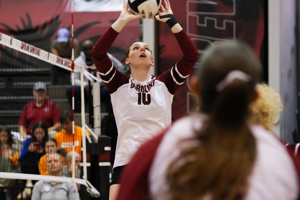 <p>Junior setter Sarah Jordan sets the ball to the outside hitter on Nov. 3, 2024 during the Tennessee game. Jordan had 30 assists during the match and has 652 assists on the season.</p>