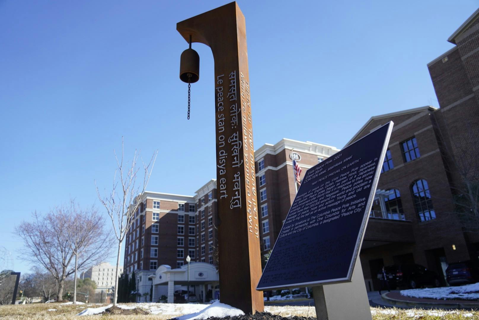 The Vista Peace Pole outside of the USC Alumni Center on Jan. 22, 2022. The new public art installation promotes a message of peace in eight different languages in Columbia’s Vista district.