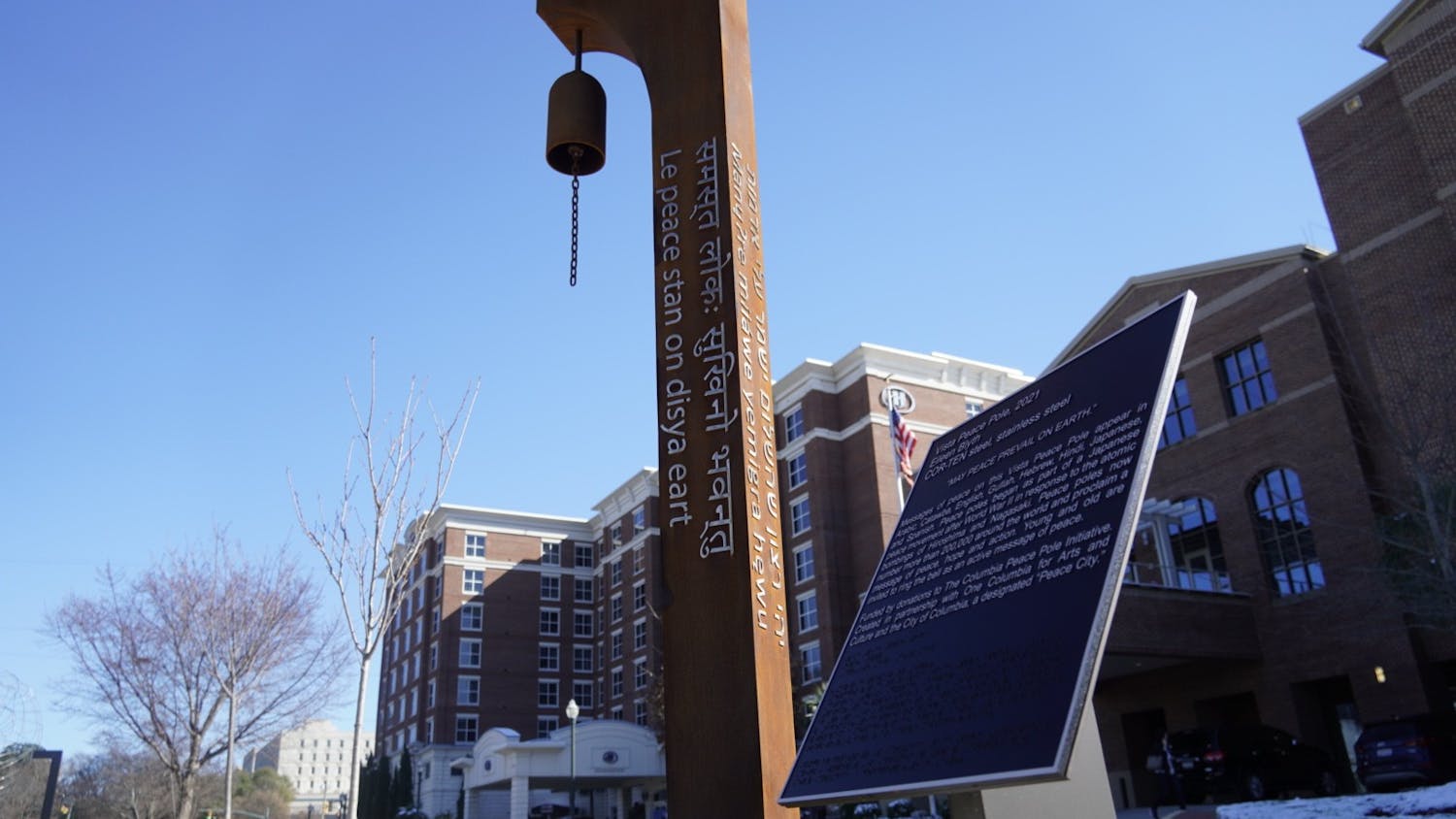 The Vista Peace Pole outside of the USC Alumni Center on Jan. 22, 2022. The new public art installation promotes a message of peace in eight different languages in Columbia’s Vista district.