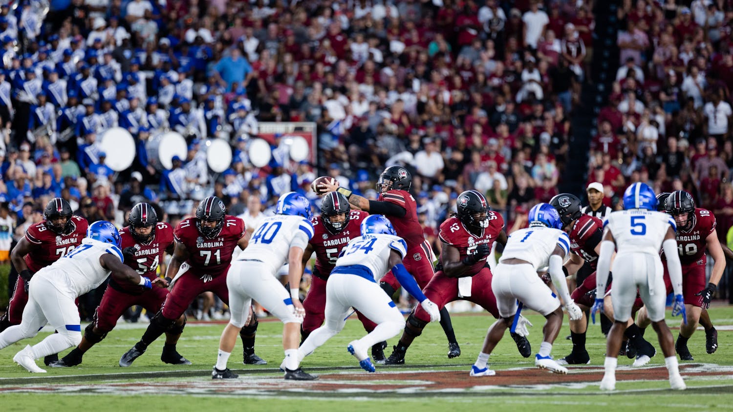 FILE — Junior quarterback Spencer Rattler passes off the ball during the South Carolina and Georgia State game in Columbia, S.C., on Sept. 3, 2022. The Gamecocks won 35-14 against the Panthers.