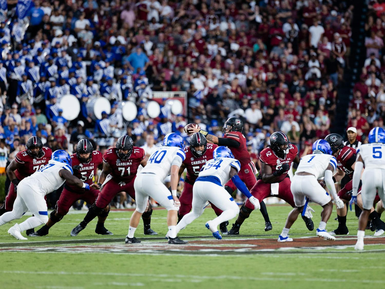 FILE — Junior quarterback Spencer Rattler passes off the ball during the South Carolina and Georgia State game in Columbia, S.C., on Sept. 3, 2022. The Gamecocks won 35-14 against the Panthers.