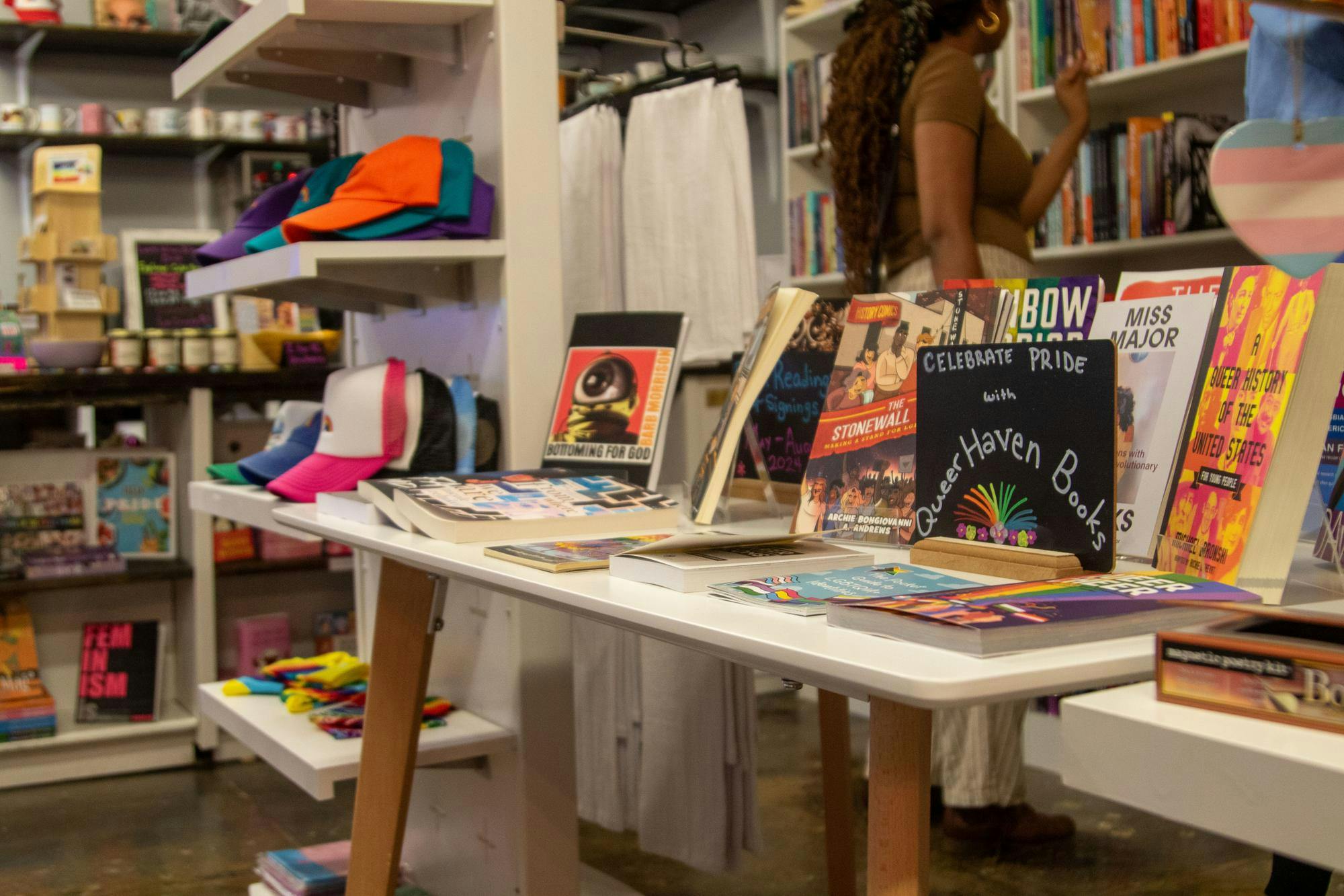 Books on a table inside Queer Haven Books on June 2, 2024. Queer Haven Books, South Carolina's only independent queer bookstore, offers a safe space with diverse books, coffee, snacks, and queer-themed products.