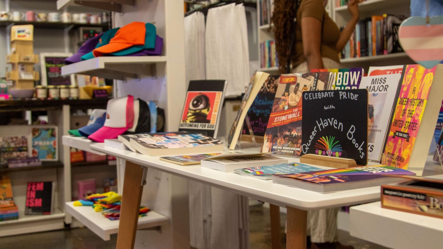 Books on a table inside Queer Haven Books on June 2, 2024. Queer Haven Books, South Carolina's only independent queer bookstore, offers a safe space with diverse books, coffee, snacks, and queer-themed products.