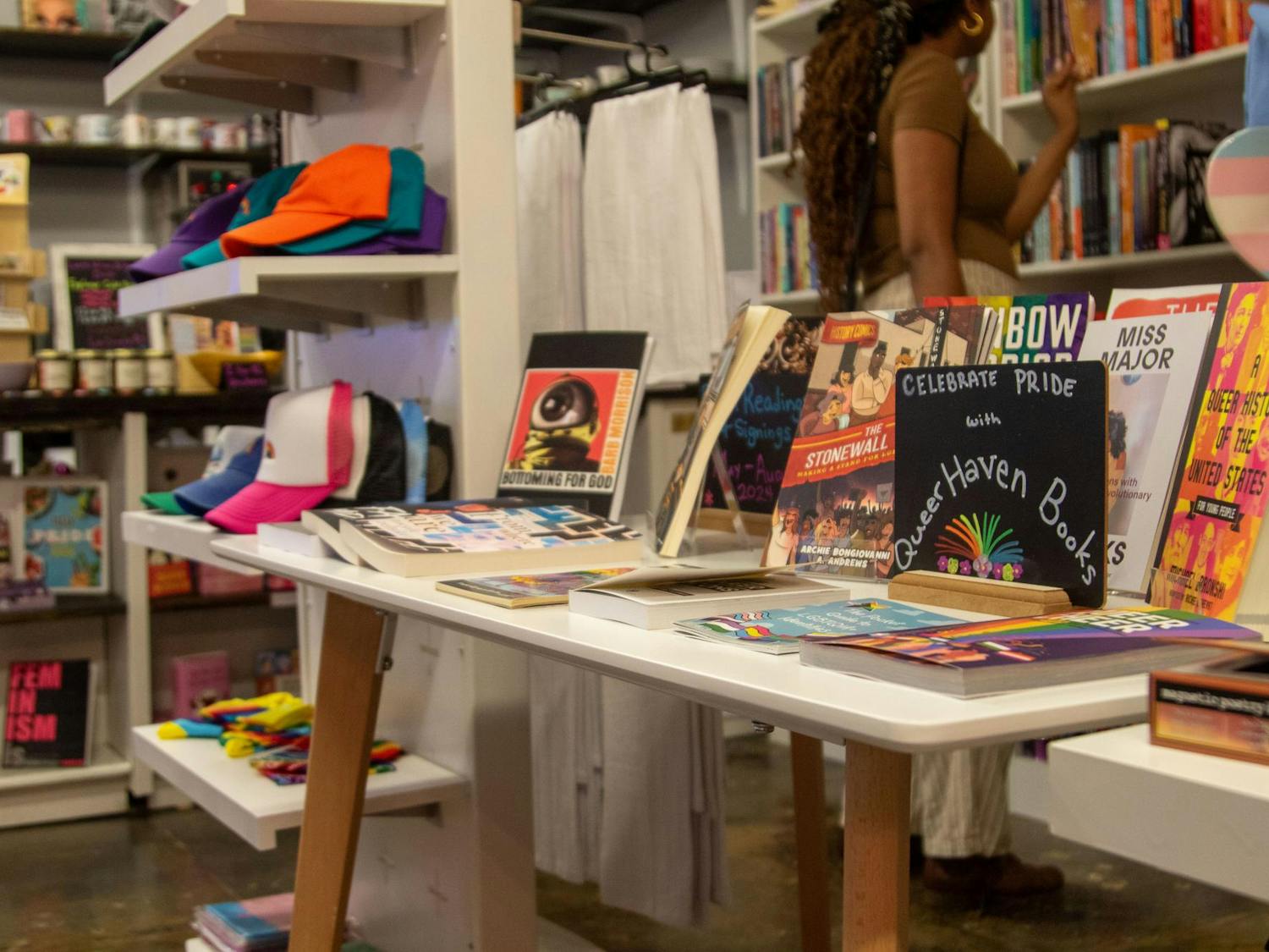 Books on a table inside Queer Haven Books on June 2, 2024. Queer Haven Books, South Carolina's only independent queer bookstore, offers a safe space with diverse books, coffee, snacks, and queer-themed products.