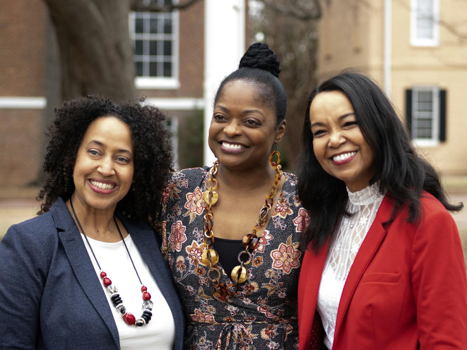 Three USC alumnae and interviews in the student documentary, "The Backbone," pose for a photo at the Horseshoe on Feb. 10, 2023. The Office of Diversity, Equity and Inclusion revealed 18 new bricks in honor of them women that created the film.&nbsp;