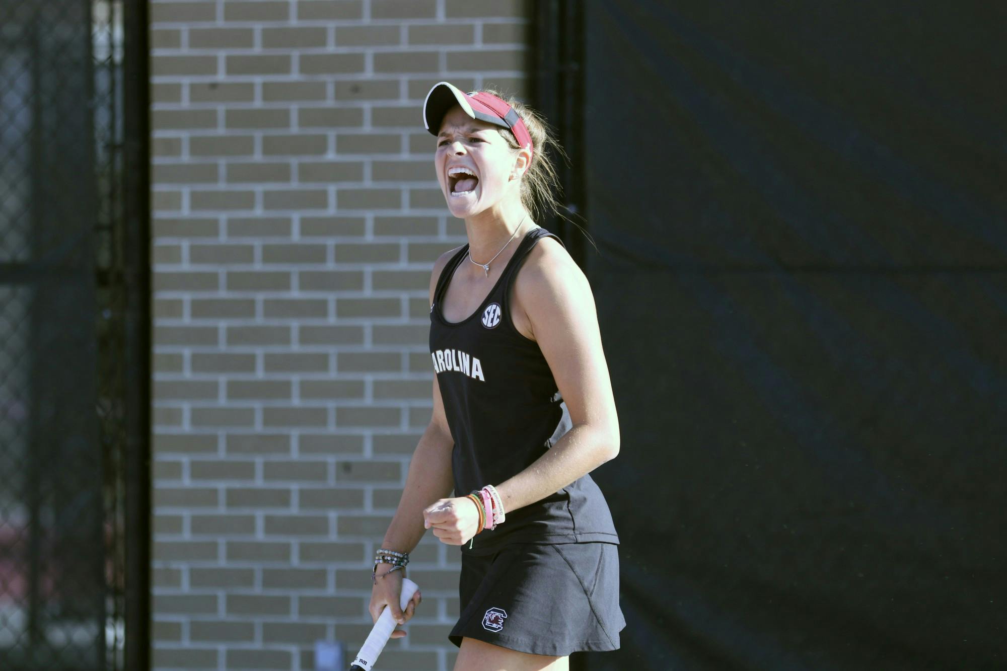 Freshman Emma Shelton celebrates her victory after defeating her opponent 6-3, 6-3. Overall, the Gamecocks followed this trend and beat Clemson 6-1.
