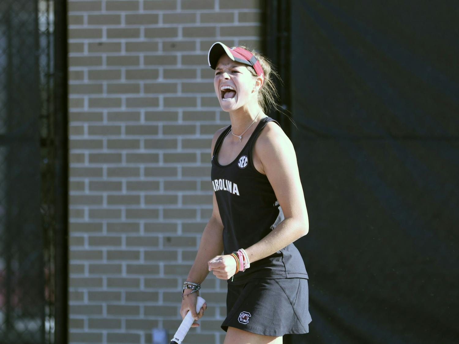 Freshman Emma Shelton celebrates her victory after defeating her opponent 6-3, 6-3. Overall, the Gamecocks followed this trend and beat Clemson 6-1.
