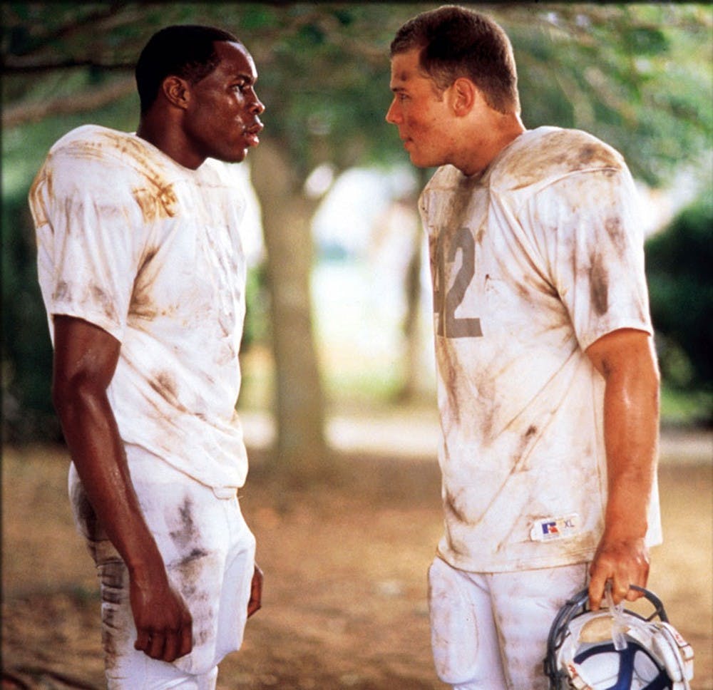 	“Remember the Titans” follows an underdog high school football team as players overcome their racial differences.