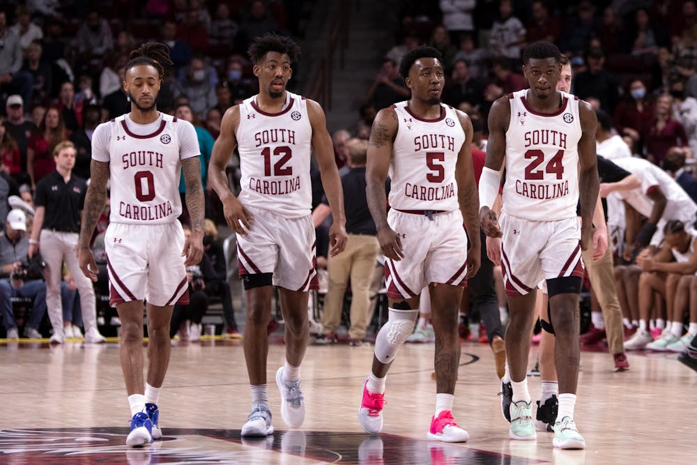 FILE— The South Carolina men’s basketball team walking up the court at Colonial Life Area in Columbia, SC during their game versus Louisiana State University on Feb. 19, 2022. The Gamecocks beat the Tigers 77-75.