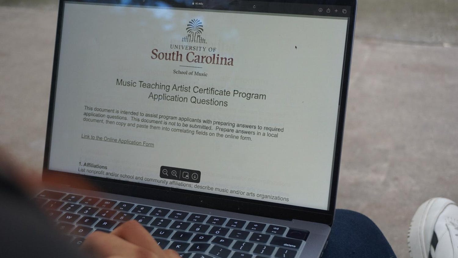 A USC student looks at the Music Teaching Artist Certificate Program application which will guide and support USC students in the School of Music to expand music learning in South Carolina on Nov. 6, 2024. 10 students will be chosen for this scholarship, and the application will end on Dec. 2.