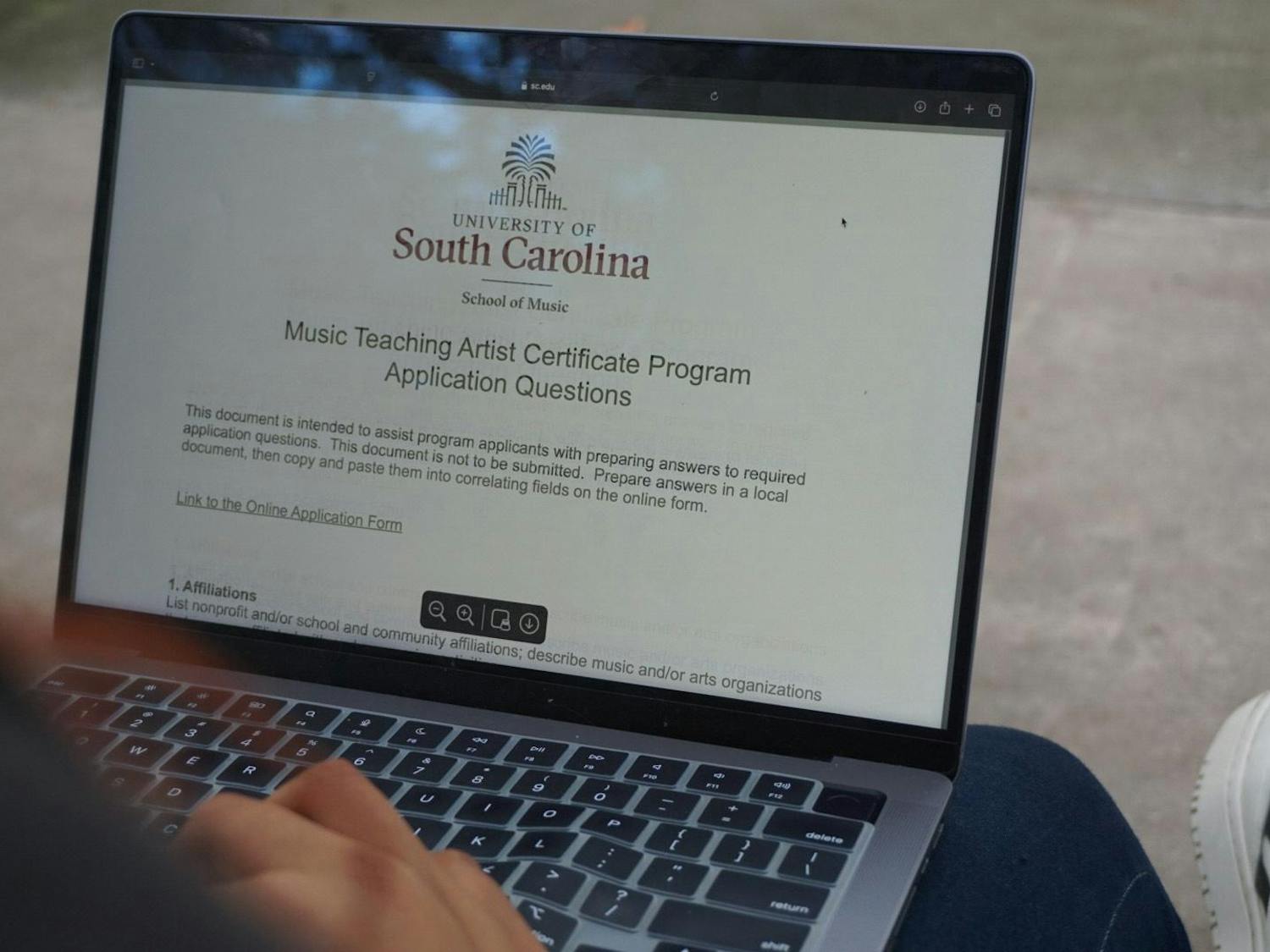 A USC student looks at the Music Teaching Artist Certificate Program application which will guide and support USC students in the School of Music to expand music learning in South Carolina on Nov. 6, 2024. 10 students will be chosen for this scholarship, and the application will end on Dec. 2.