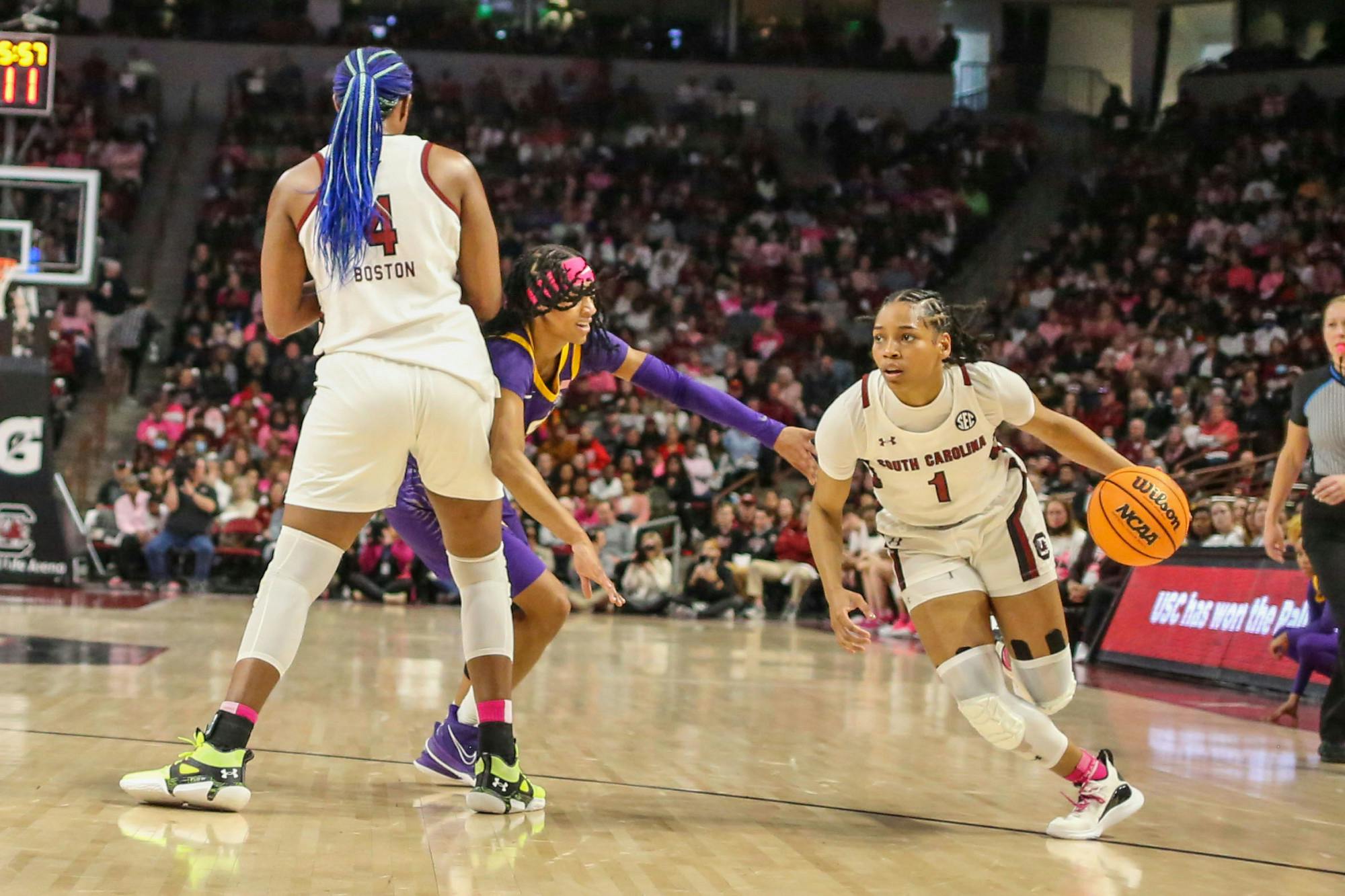 Senior guard Zia Cooke dribbles the ball through a screen set by senior forward Aliyah Boston during South Carolina’s game against LSU at Colonial Life Arena on Feb. 12, 2023. The Gamecocks beat the Tigers 88-64. 