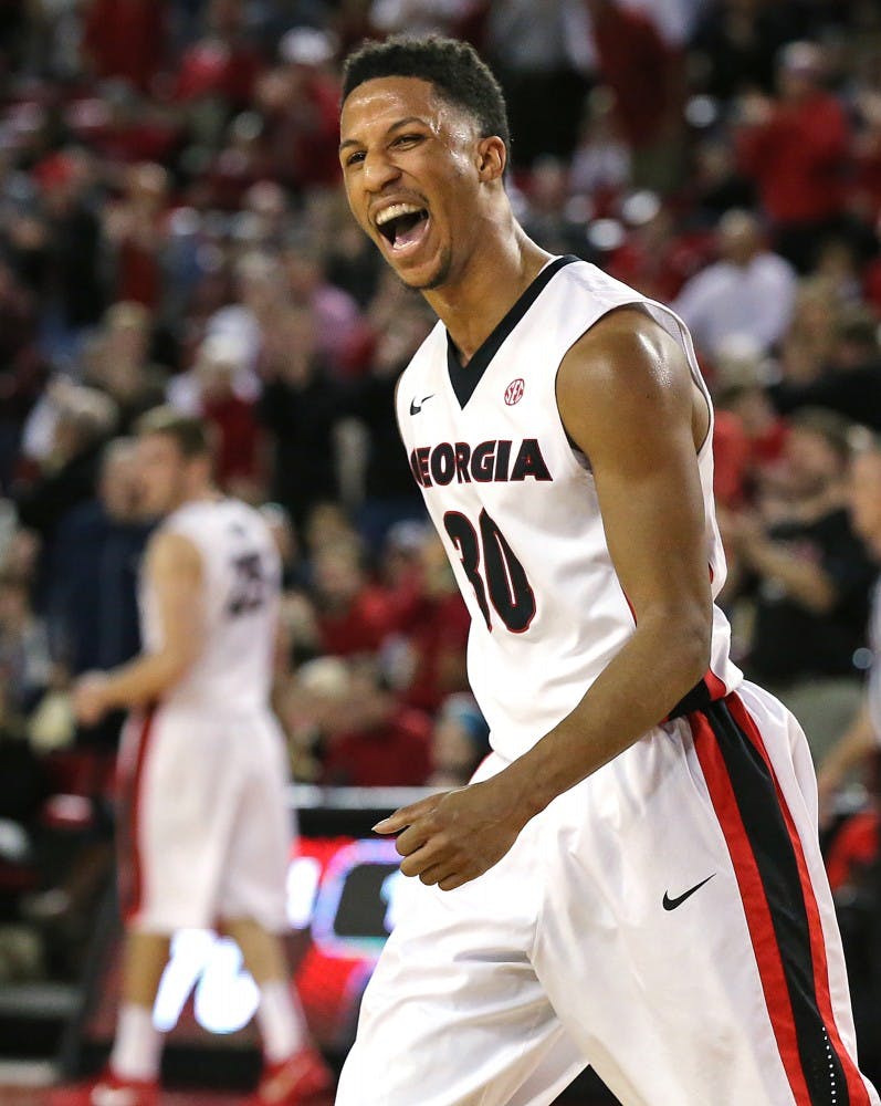 Georgia's J.J. Frazier, who paced Georgia with 35 points, begins to celebrate a 75-61 victory against Georgia Tech in the final seconds on Saturday, Dec. 19, 2015, at Stegeman Coliseum in Athens, Ga. (Curtis Compton/Atlanta Journal-Constitution/TNS)