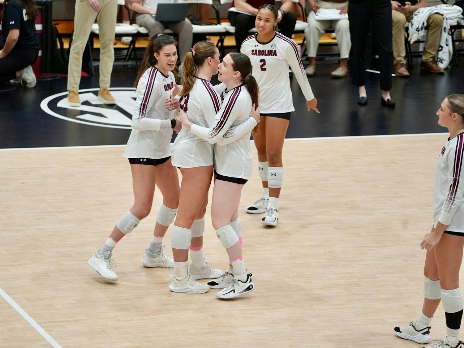 South Carolina players celebrate a point during the team’s match against Alabama on Oct. 19, 2025, at the Carolina Volleyball Center. Despite their efforts, the Gamecocks were swept by the Crimson Tide, 3-0. 