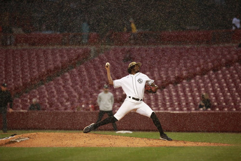 <p>Fifth-year pitcher Ty Good throws the ball during South Carolina's matchup against Gardner-Webb on Feb. 27, 2024. Light rain showers persisted throughout the ɫɫƵs' 7-1 victory over the Runnin' Bulldogs, extending the game for nearly 20 minutes.</p>