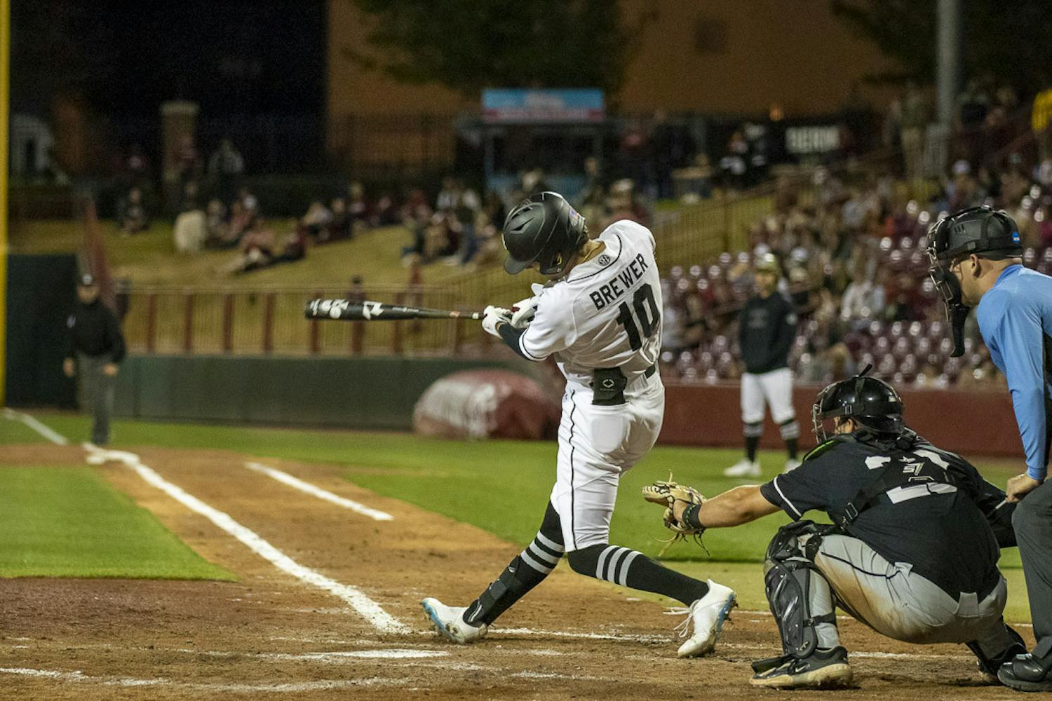 Senior outfielder Dylan Brewer battles at the plate against USC Upstate's pitcher before launching a home run for the Gamecocks on April 11, 2023, at Founders Park. The Gamecocks beat the Spartans 7-2.