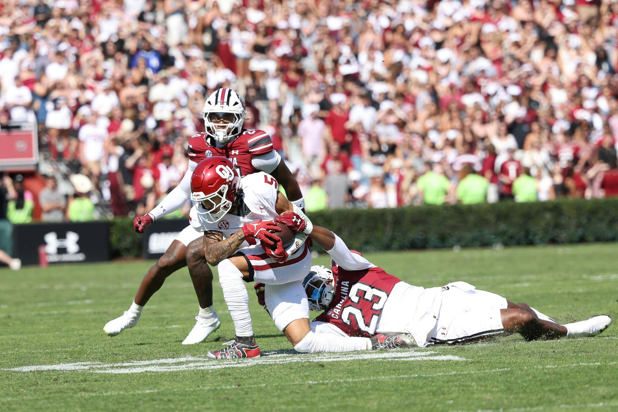 The South Carolina Gamecocks played against the Oklahoma Sooners on Saturday, Oct. 18, 2025 at Williams-Brice Stadium.&nbsp;Junior defensive back Jalon Kilgore and junior running back Isaiah Augustave tackle an Oklahoma player.