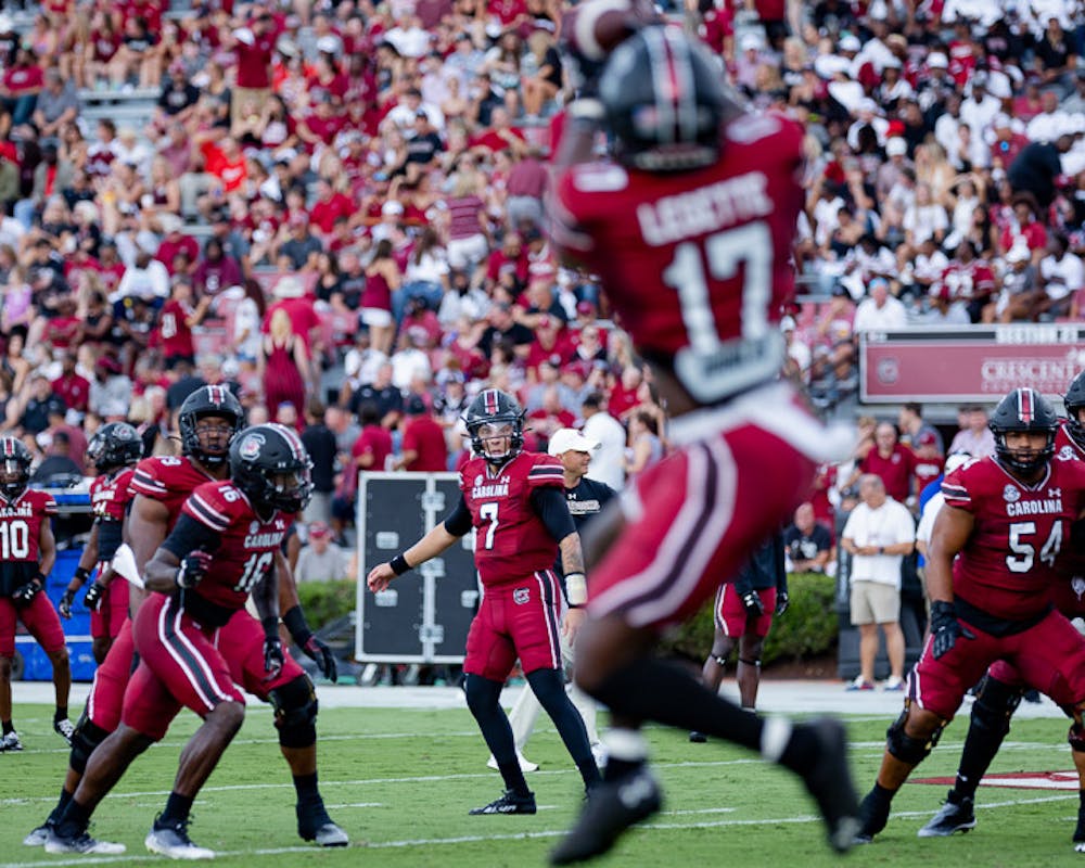 <p>Redshirt Junior Quarterback Spencer Rattler completes a pass to Senior Wide Receiver Xavier Legette during the match against Georgia State University on September 3, 2022. The Gamecocks beat the Panthers 35-14.</p>