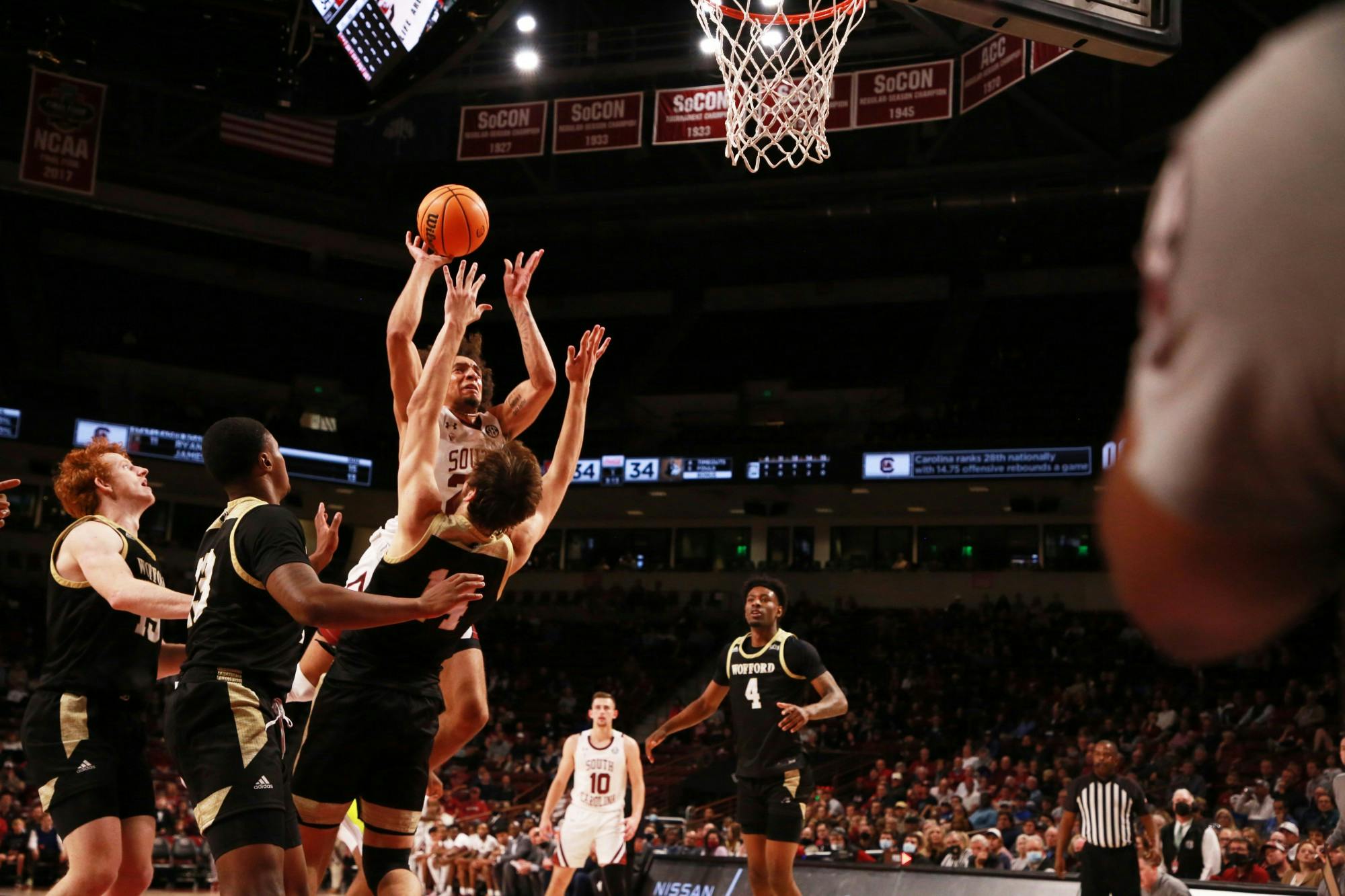 Freshman Devin Carter driving to the basket to score a point for the Gamecocks. 