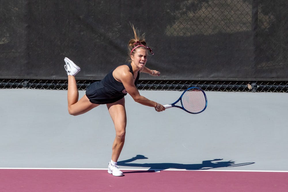 <p>Freshman Sarah Hamner serves during a singles match against Clemson on Sunday, Feb. 20, 2022. The Gamecocks won both matches of the doubleheader, beating Clemson 4-2, and Charleston Southern 6-1.&nbsp;</p>