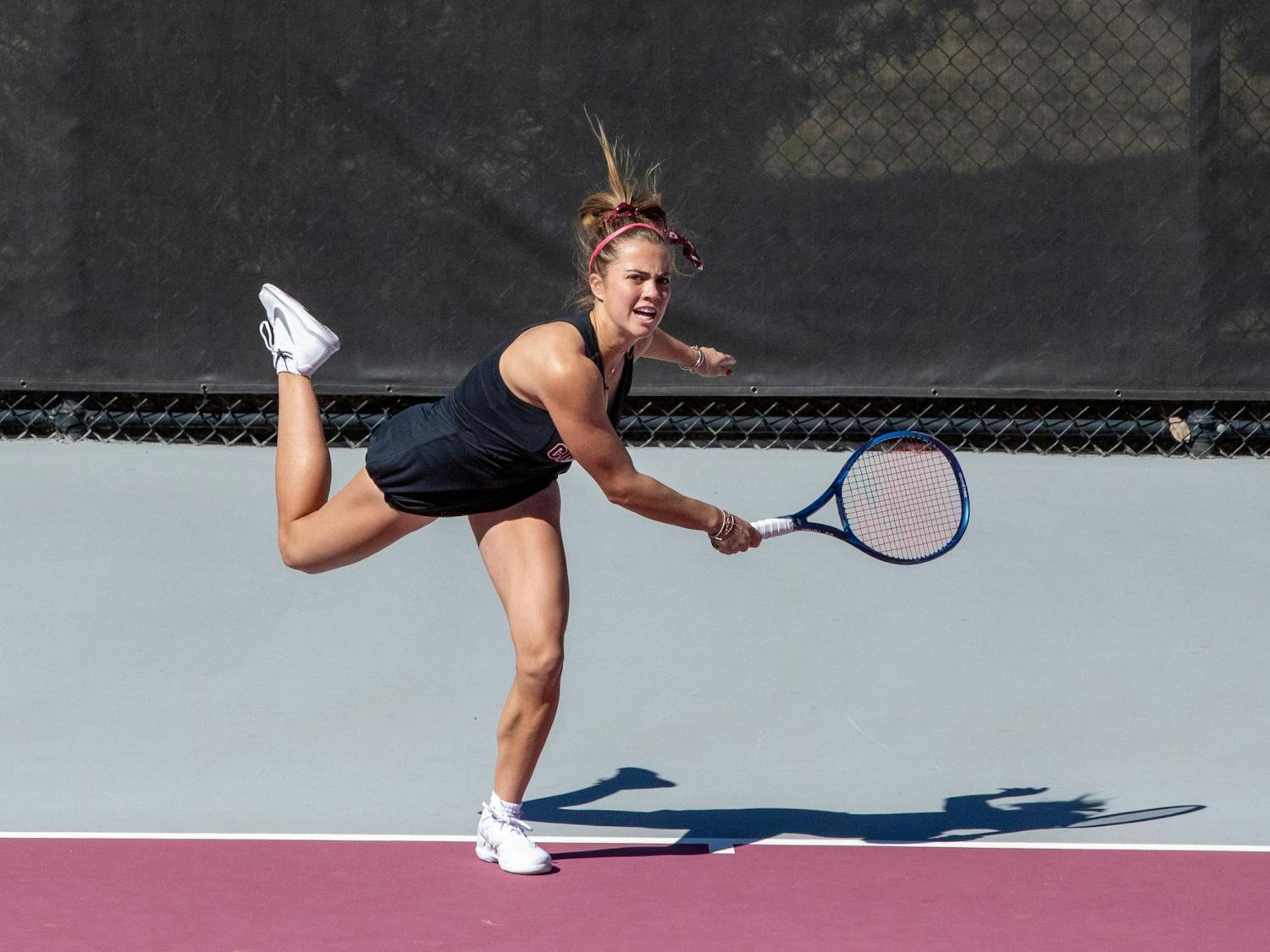 Freshman Sarah Hamner serves during a singles match against Clemson on Sunday, Feb. 20, 2022. The Gamecocks won both matches of the doubleheader, beating Clemson 4-2, and Charleston Southern 6-1.&nbsp;